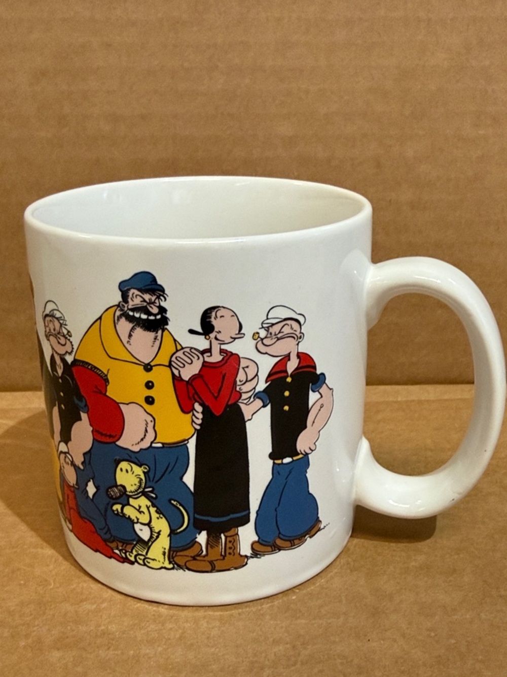 White Ceramic Mug with Colorful Cartoon Character Print